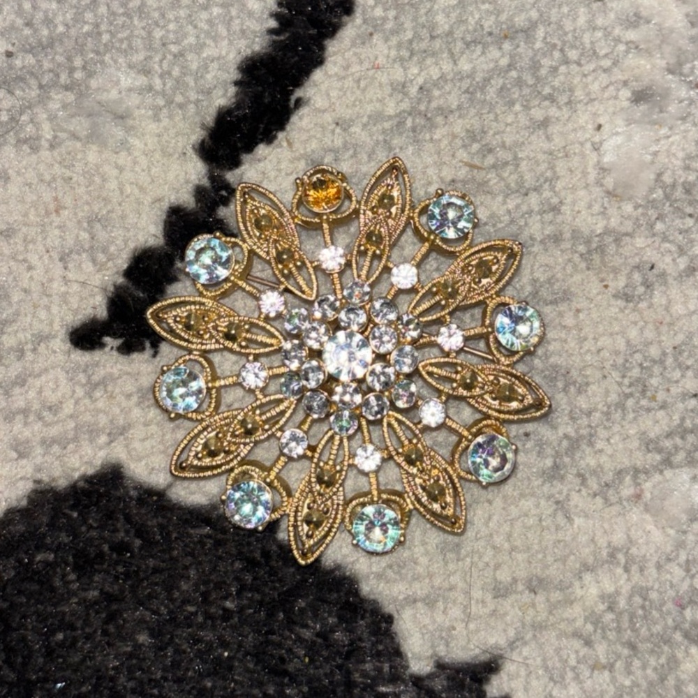 Elegant Gold and Crystal Brooch
